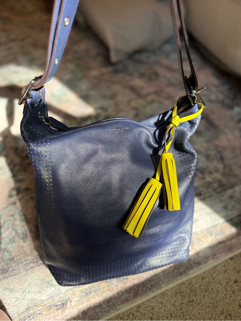 Coach Legacy perforated Navy and Citrine leather